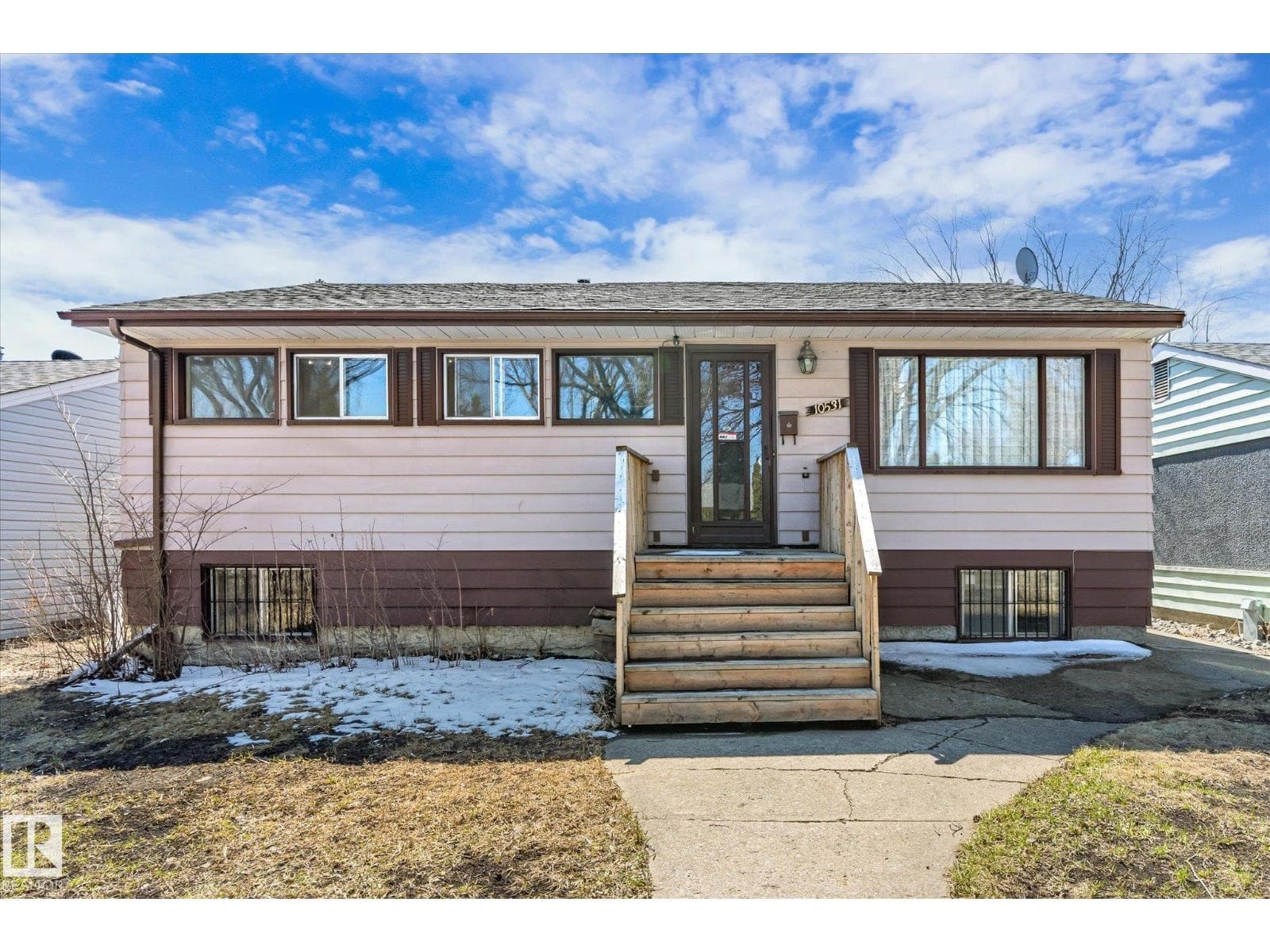 6 bed 2 bath single family at 10531 128 AV NW — $325,000