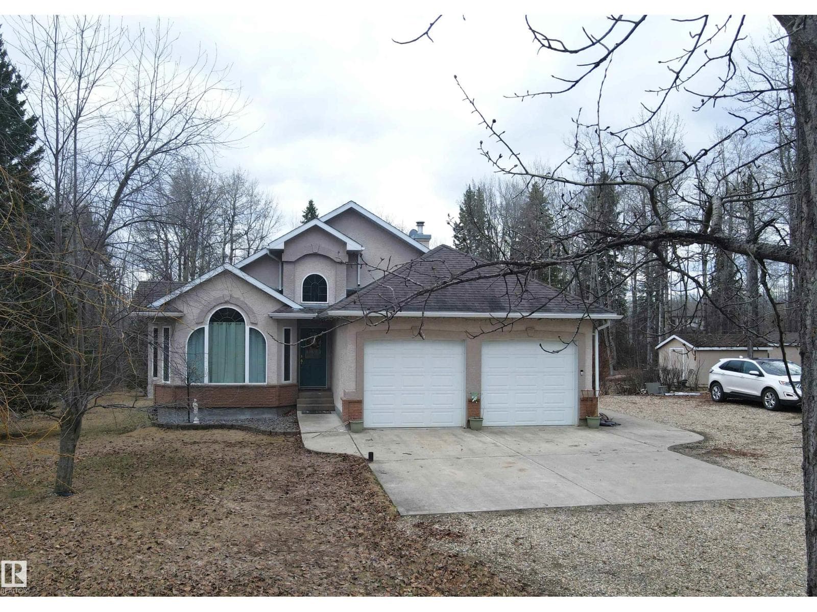 4 bed 3 bath single family at #302 49006 Range Road 73 — $780,000