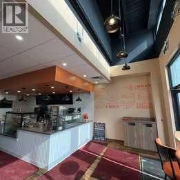 retail at 30 Savanna Crescent NE — $800,000