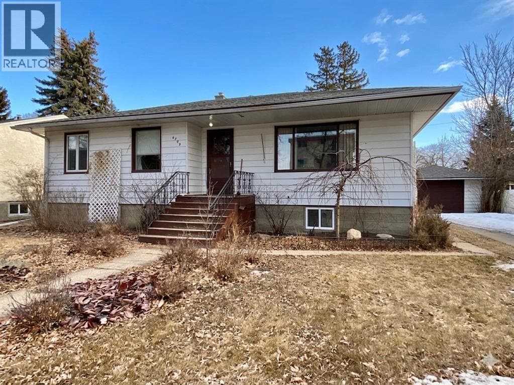 4 bed 2 bath single family at 4709 46 Street — $299,000