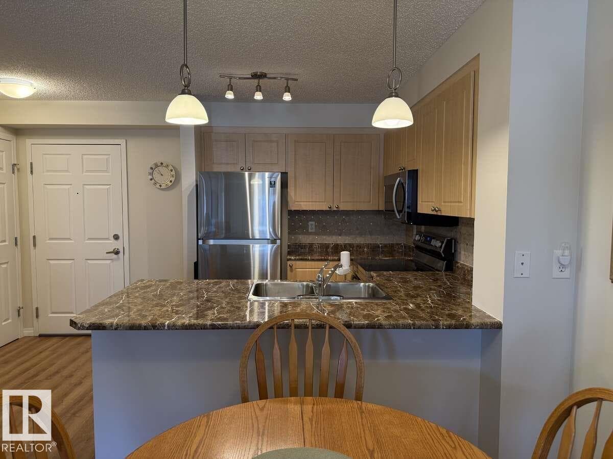 #113 616 MCALLISTER LO SW — photo 4