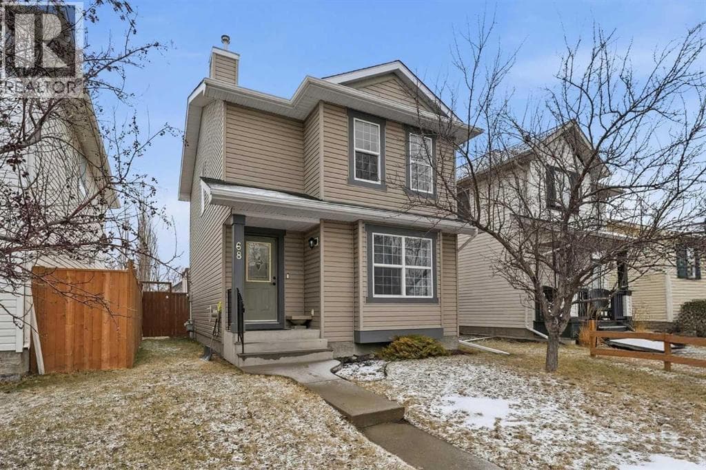 4 bed 2 bath single family at 68 Bridleridge Gardens SW — $519,900