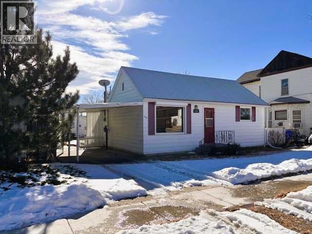 2 bed 1 bath single family at 341 50 Avenue W — $220,000
