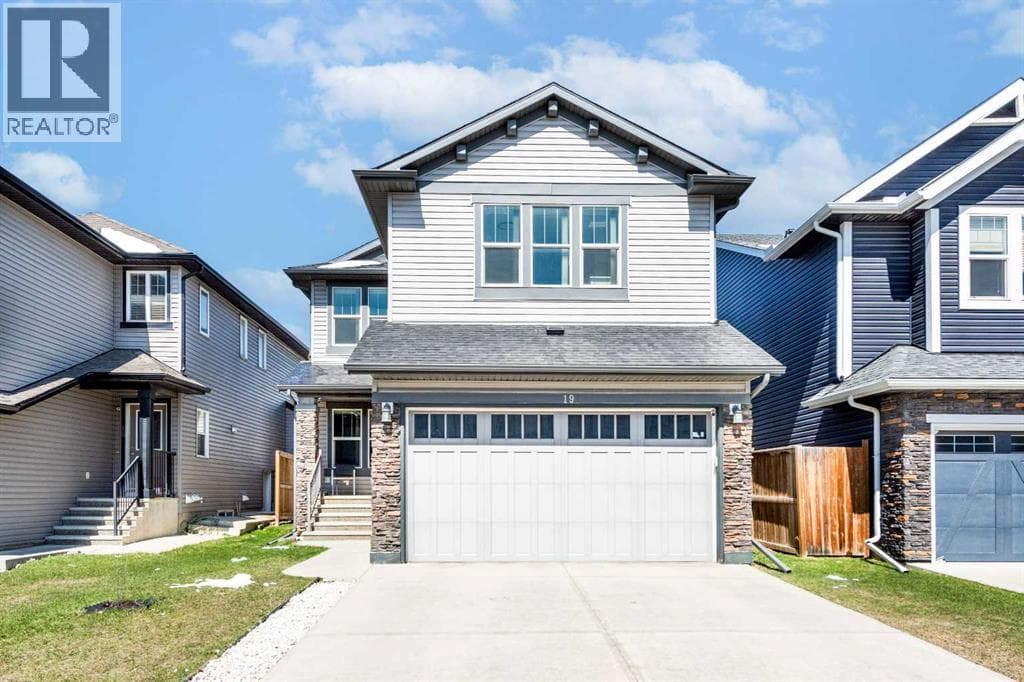 6 bed 5 bath single family at 19 Skyview Ranch Crescent NE — $760,000