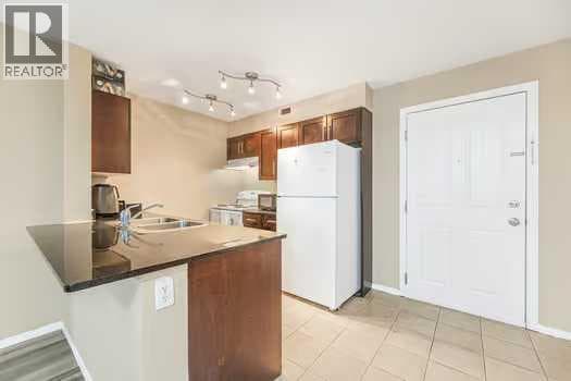 215, 355 Taralake Way NE photo 5