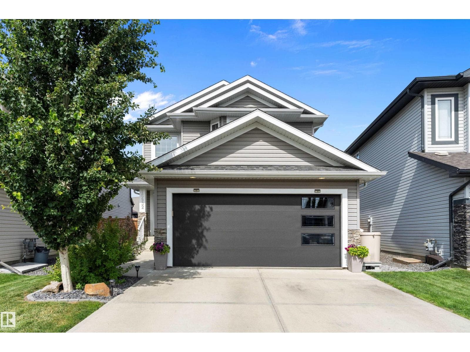 3 bed 3 bath single family at 16532 140 ST NW — $530,000