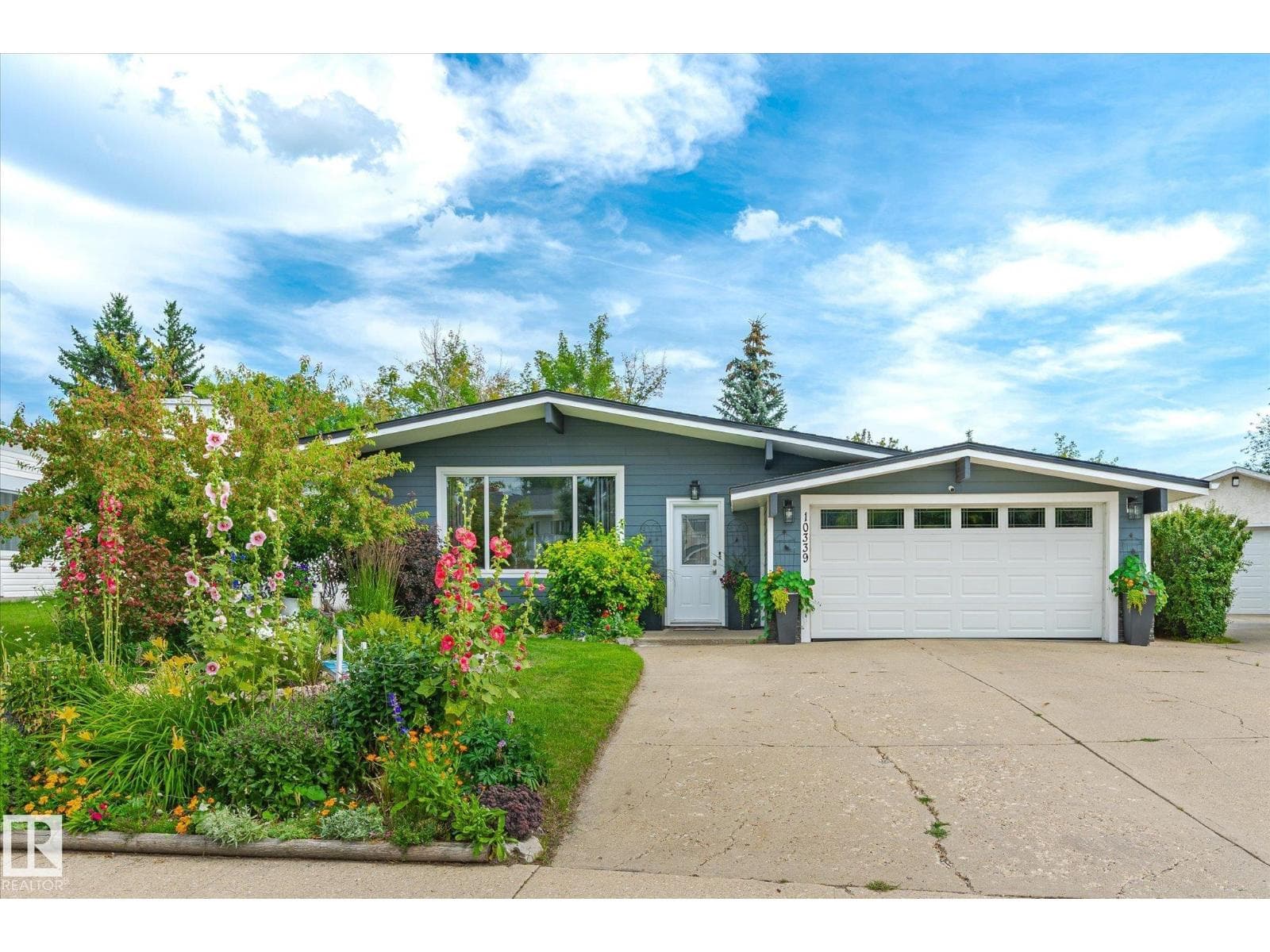 4 bed 2 bath single family at 10339 36A AV NW — $649,900