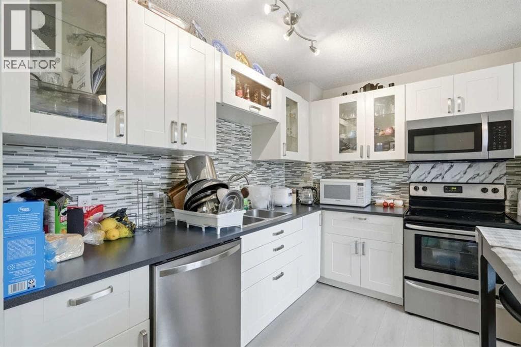 4 bed 3 bath single family at 64, 2519 38 Street NE — $349,900
