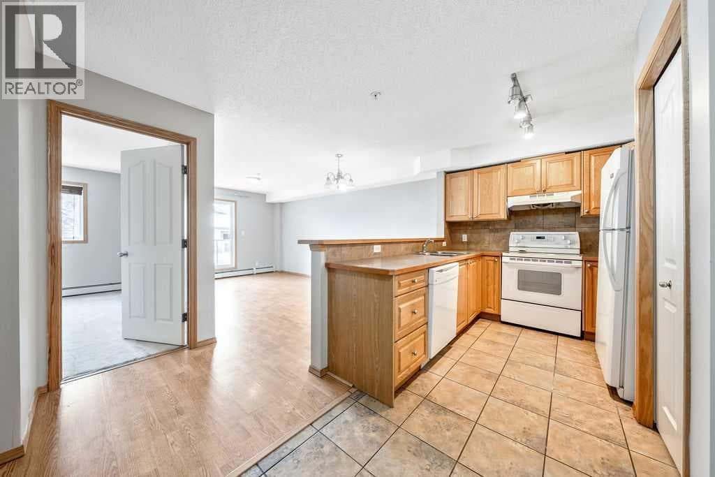 103, 92 Saddletree Court NE — photo 2