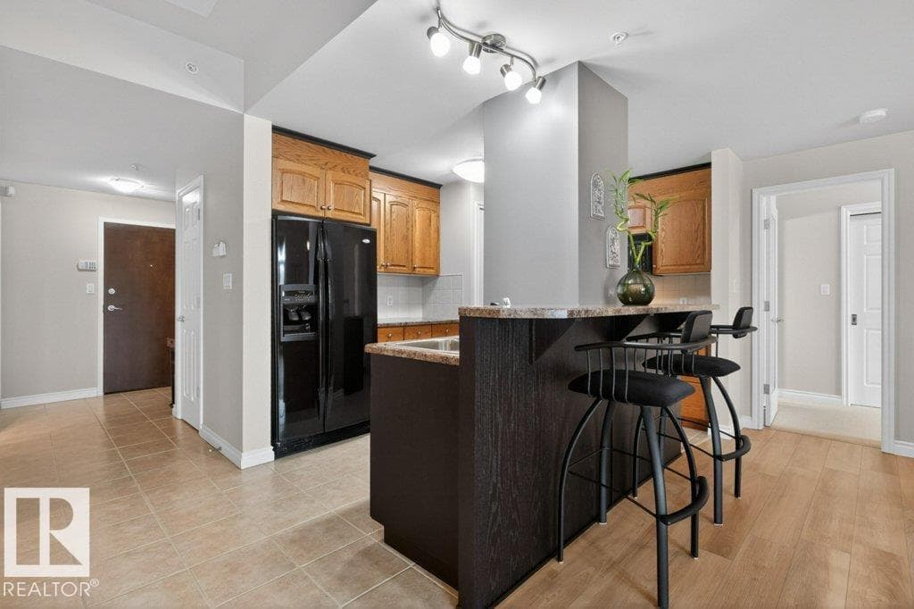 #408 9020 JASPER AV NW — photo 5