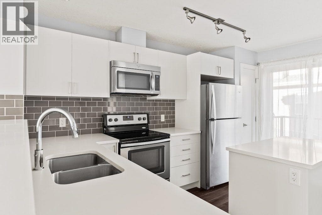 4 Evanscrest Gardens NW — photo 4