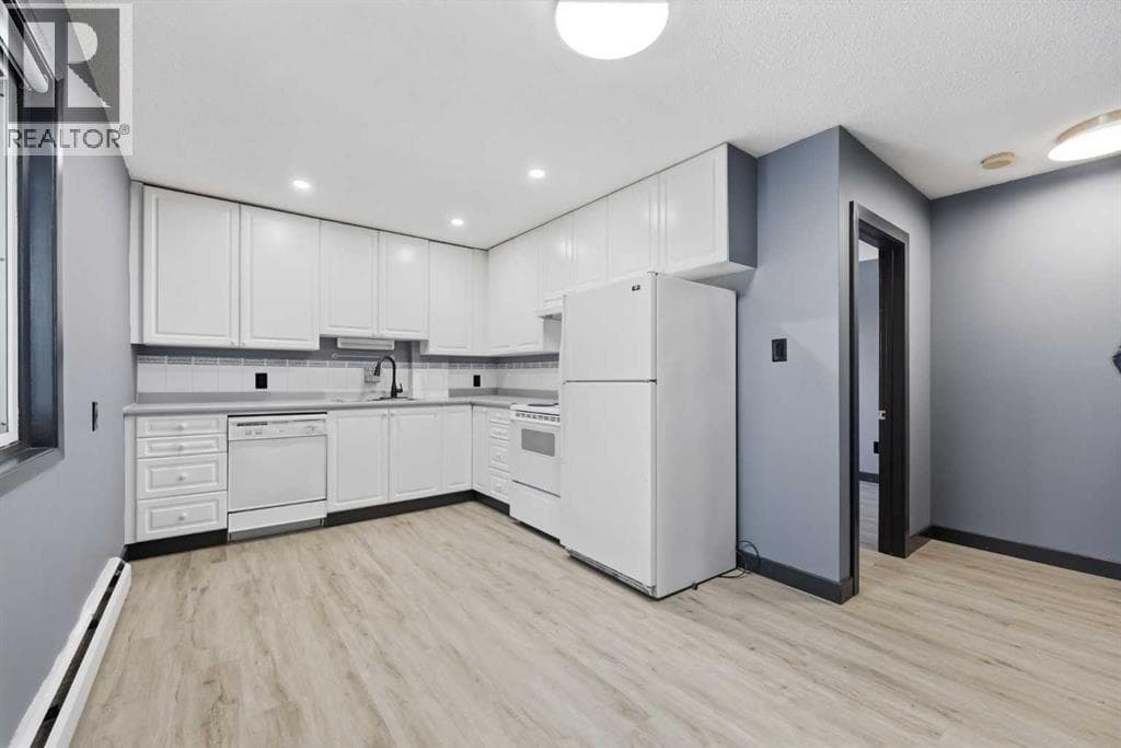 203, 3103 Blakiston Drive NW — photo 3