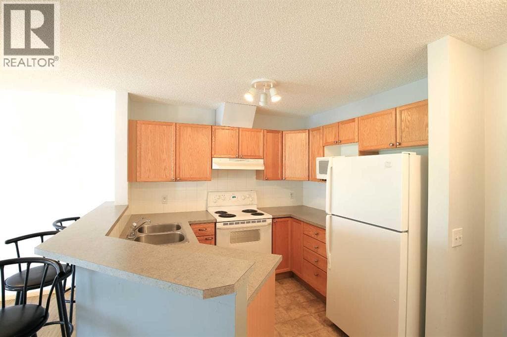 1309, 950 Arbour Lake Road NW — photo 5
