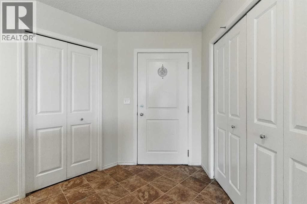 409, 15 Saddlestone Way NE — photo 3