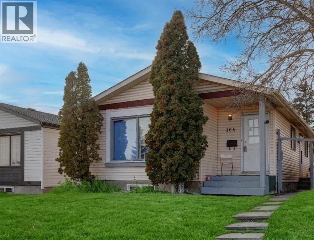 5 bed 3 bath single family at 164 Faldale Close NE — $485,000