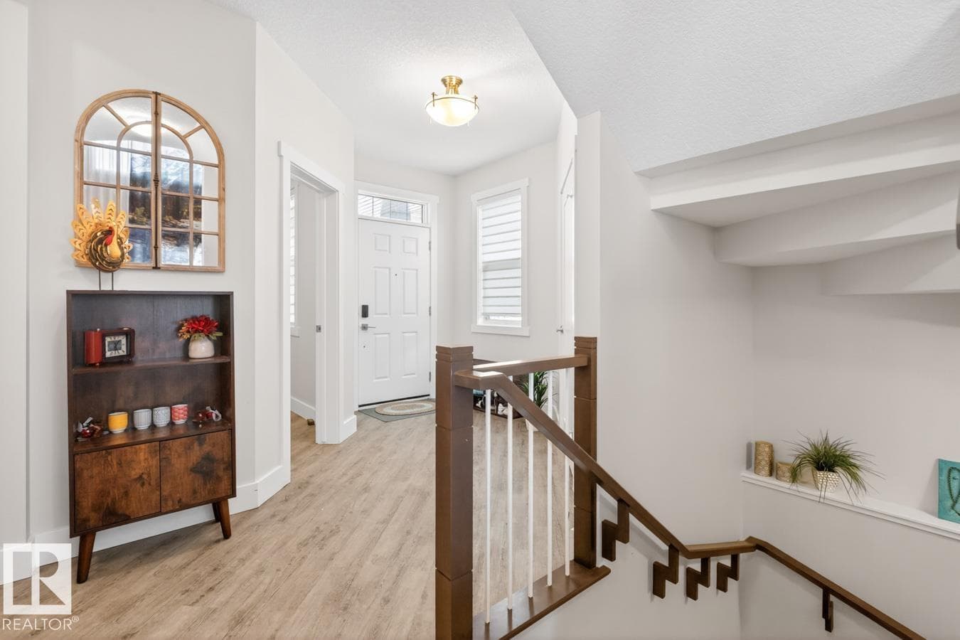 7942 ERASMUS CR NW — photo 2
