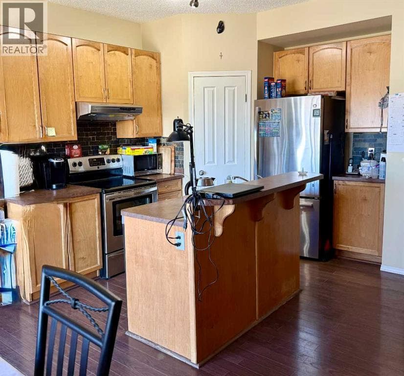 13 Tuscany Ridge Mews NW — photo 5
