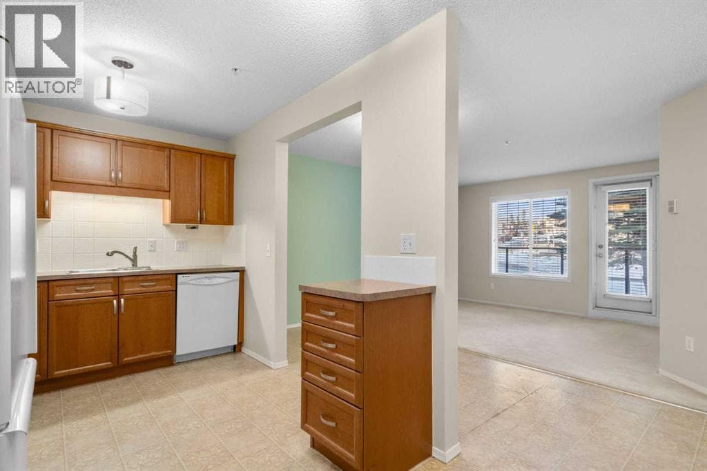 2102, 928 Arbour Lake Road NW — photo 3