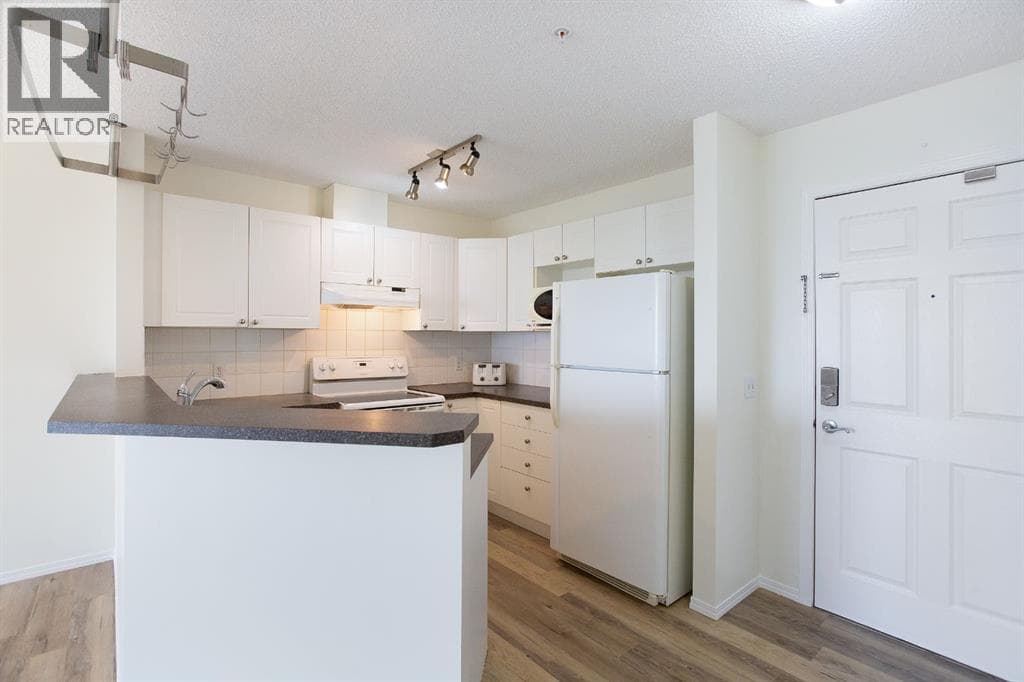 1205, 950 Arbour Lake Road NW — photo 3