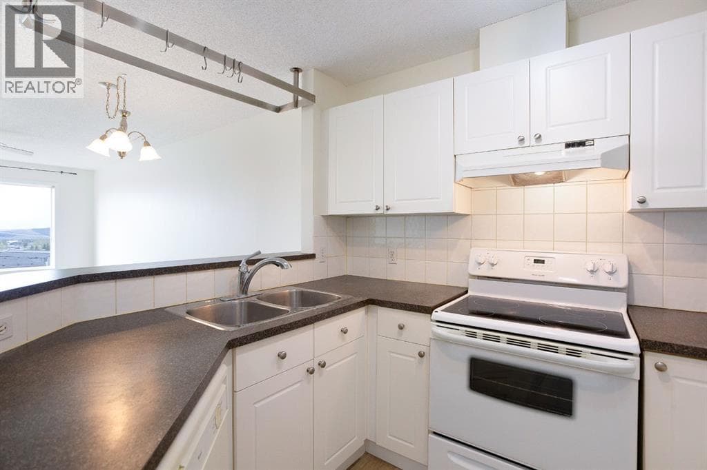 1205, 950 Arbour Lake Road NW — photo 5