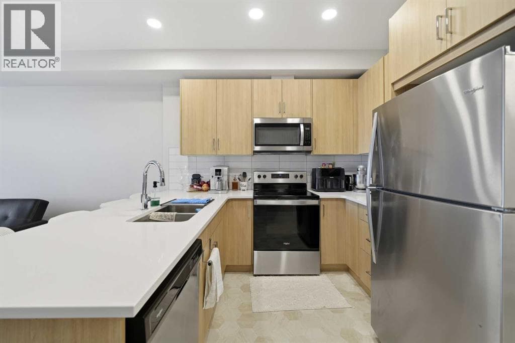 318, 55 Wolf Hollow Crescent SE — photo 4