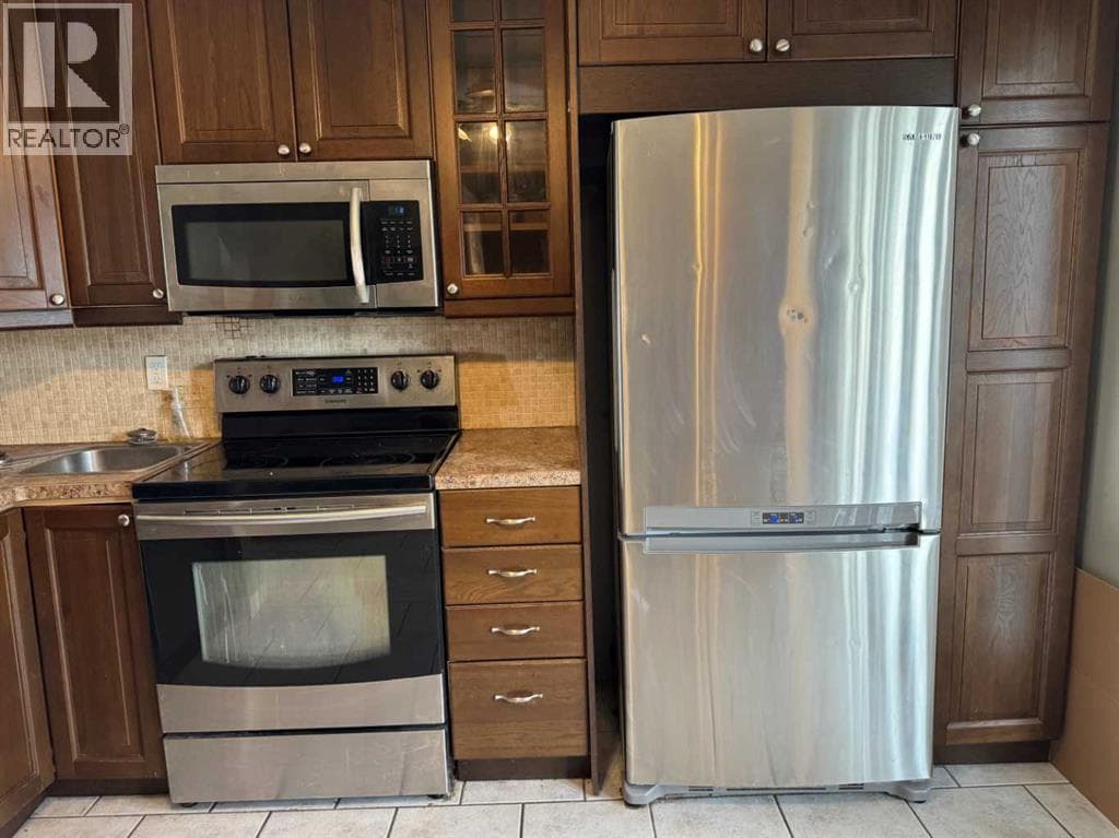 8, 220 Erin Mount Crescent SE — photo 4