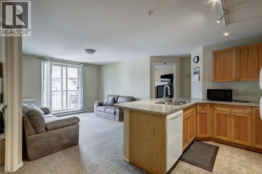 202, 186 Kananaskis Way — photo 3