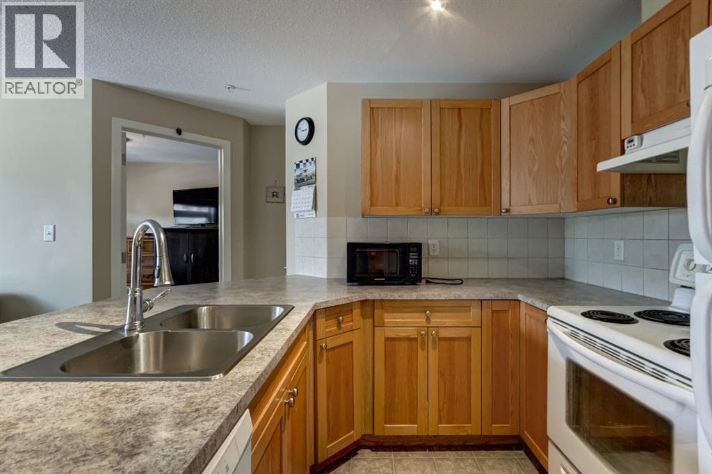 202, 186 Kananaskis Way — photo 4