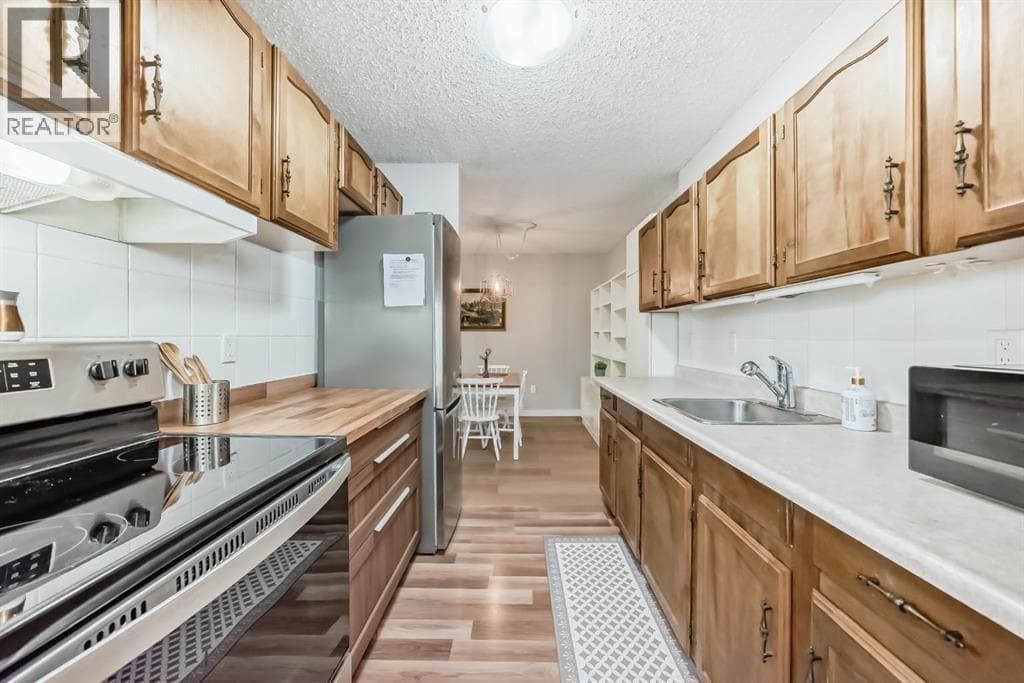 382, 8948 Elbow Drive SW — photo 3