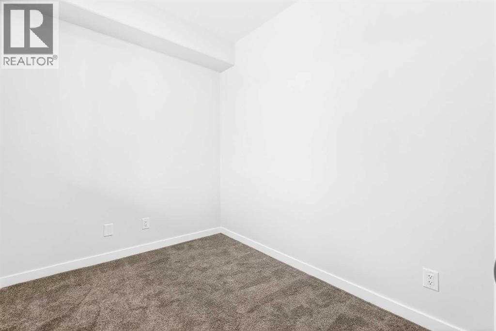 107, 40 Creekside Way SW — photo 3