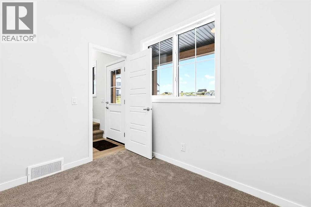 107, 40 Creekside Way SW — photo 4
