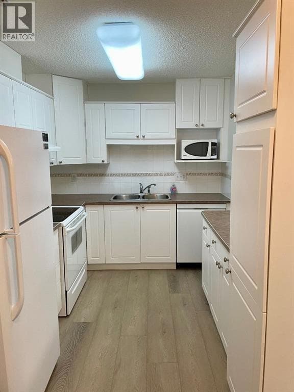 1207, 928 Arbour Lake Road NW