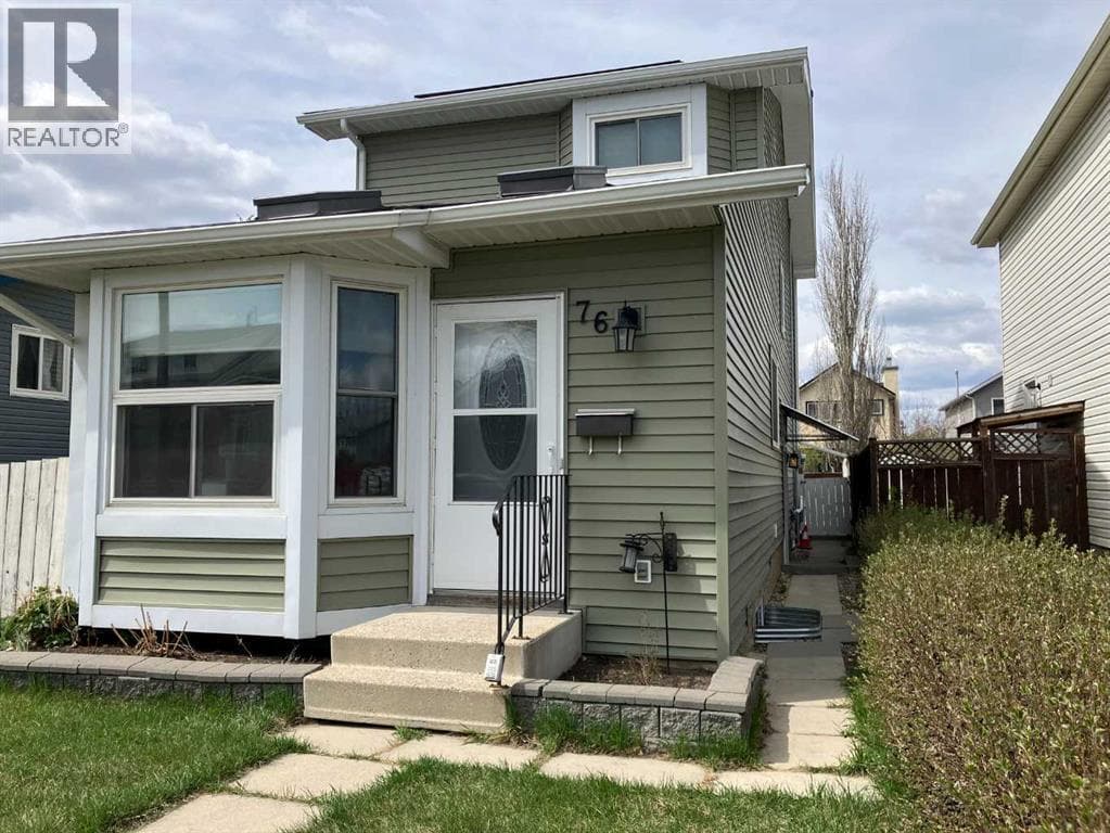 4 bed 3 bath single family at 76 Martindale Close NE — $559,000