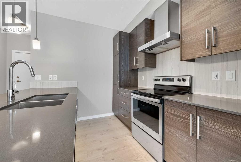 407, 122 Mahogany Centre SE — photo 5