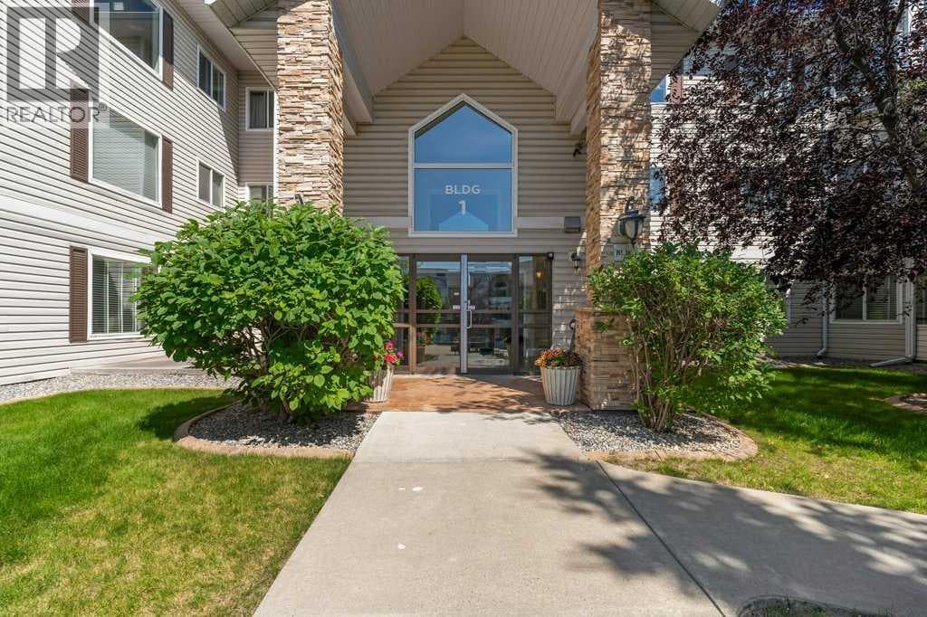 1302, 7451 Springbank Boulevard SW — photo 2