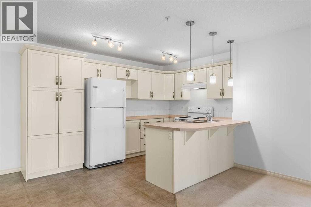 2303, 175 Panatella Hill NW — photo 5