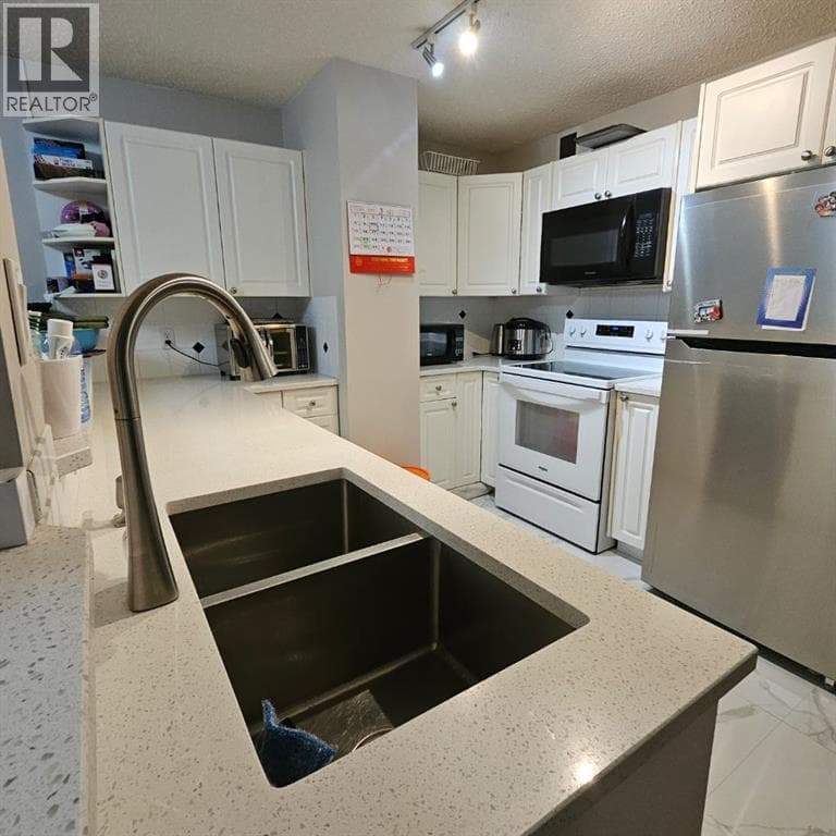 203, 511 56 Avenue SW — photo 4