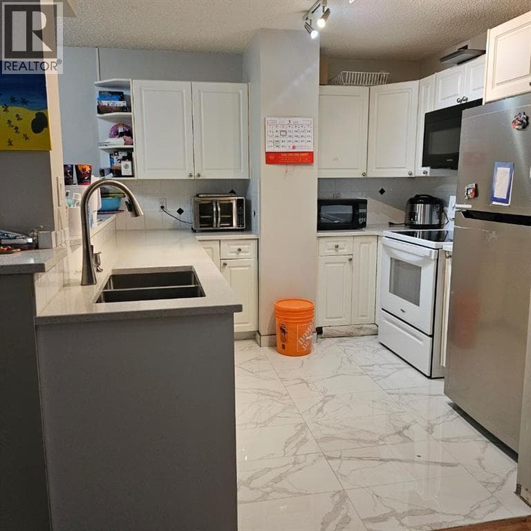 203, 511 56 Avenue SW — photo 3