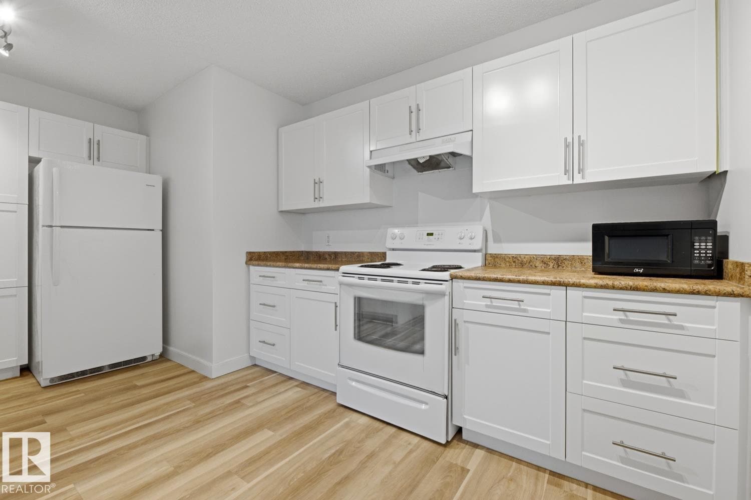 #703 9710 105 ST NW