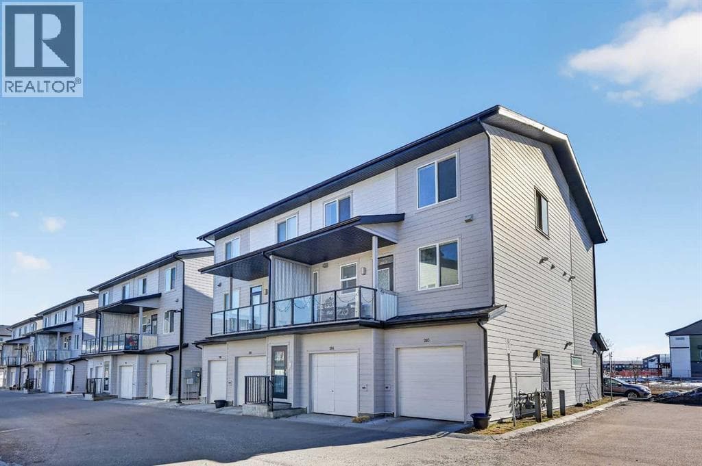 2 bed 3 bath single family at 203, 445 Redstone Walk NE — $319,000