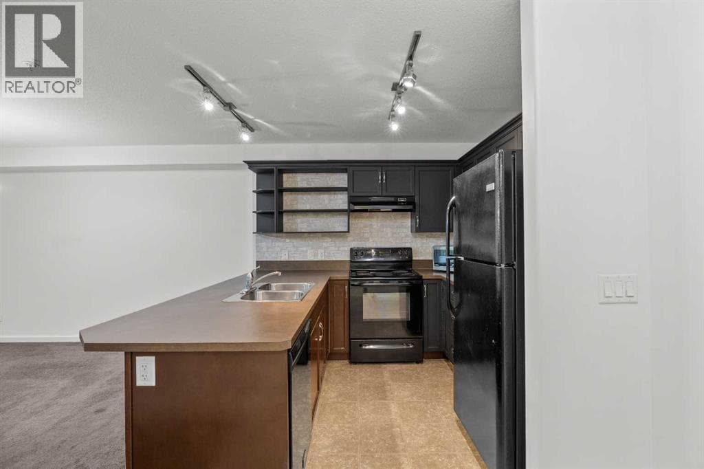 1213, 310 McKenzie Towne Gate SE — photo 5