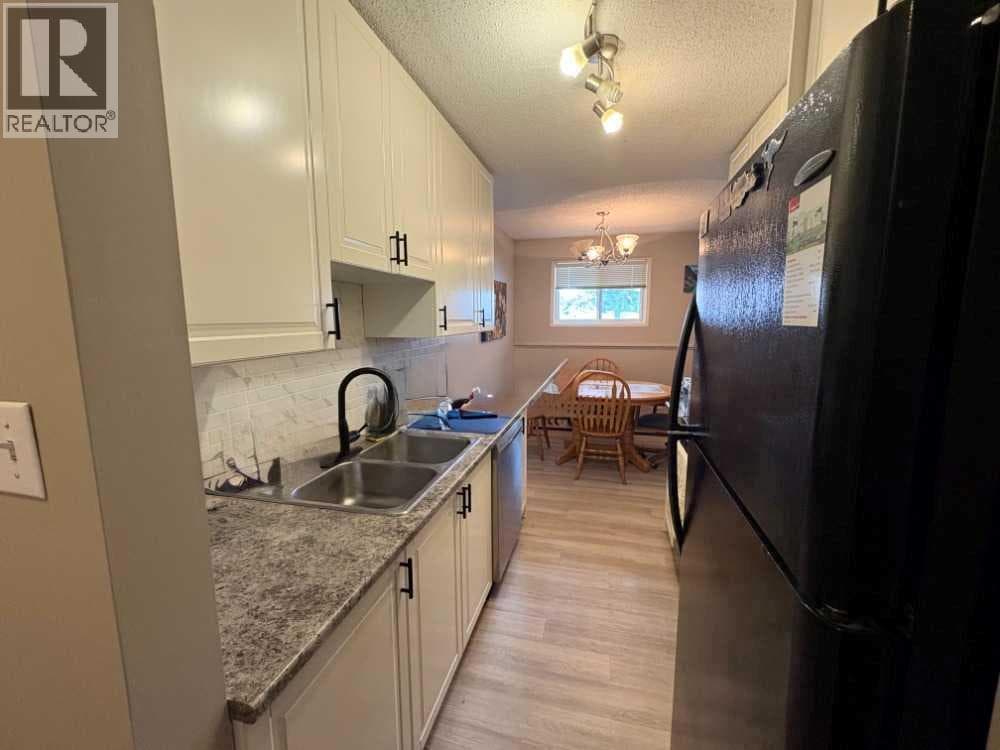 703, 11620 Elbow Drive SW — photo 3