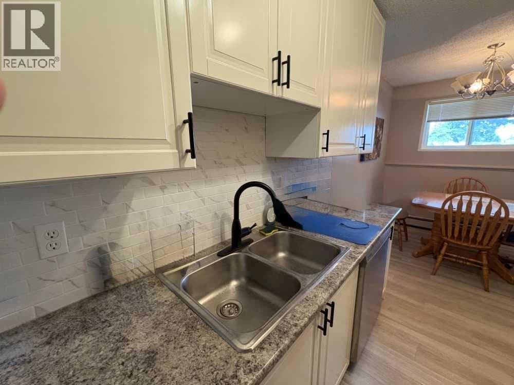 703, 11620 Elbow Drive SW — photo 4