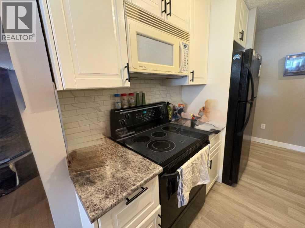 703, 11620 Elbow Drive SW — photo 5