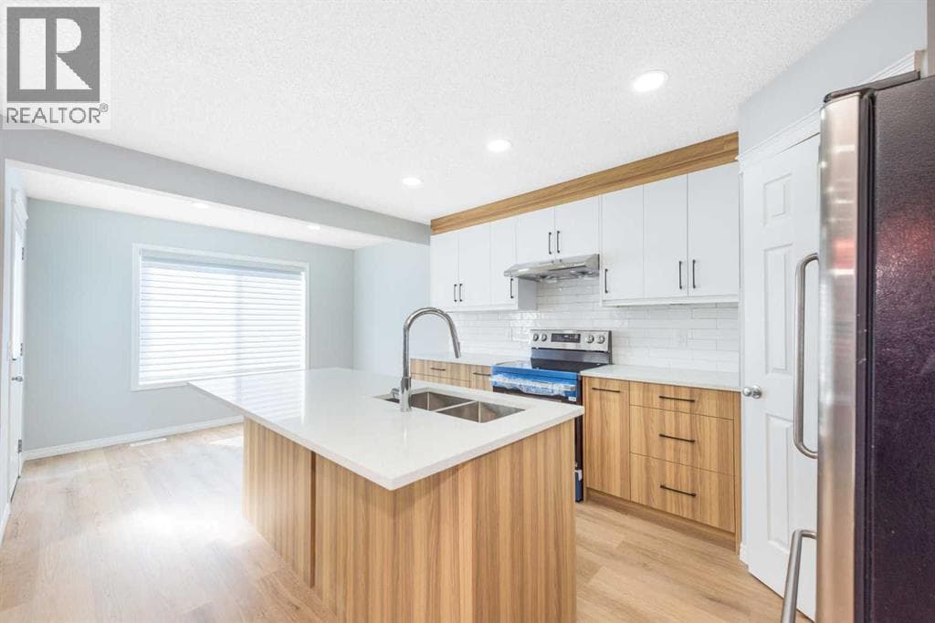 8454 Saddleridge Drive NE — photo 5