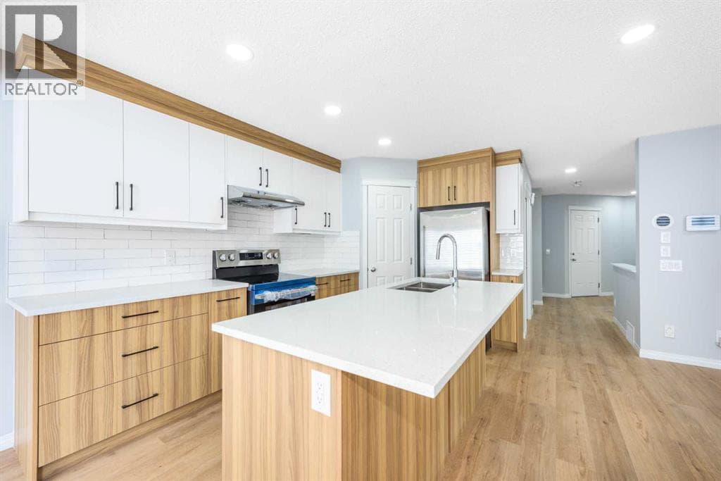 8454 Saddleridge Drive NE — photo 3