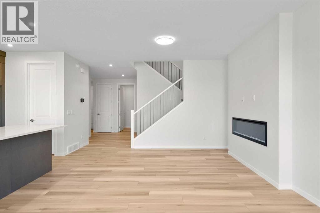 675 Buffaloberry Manor SE — photo 5