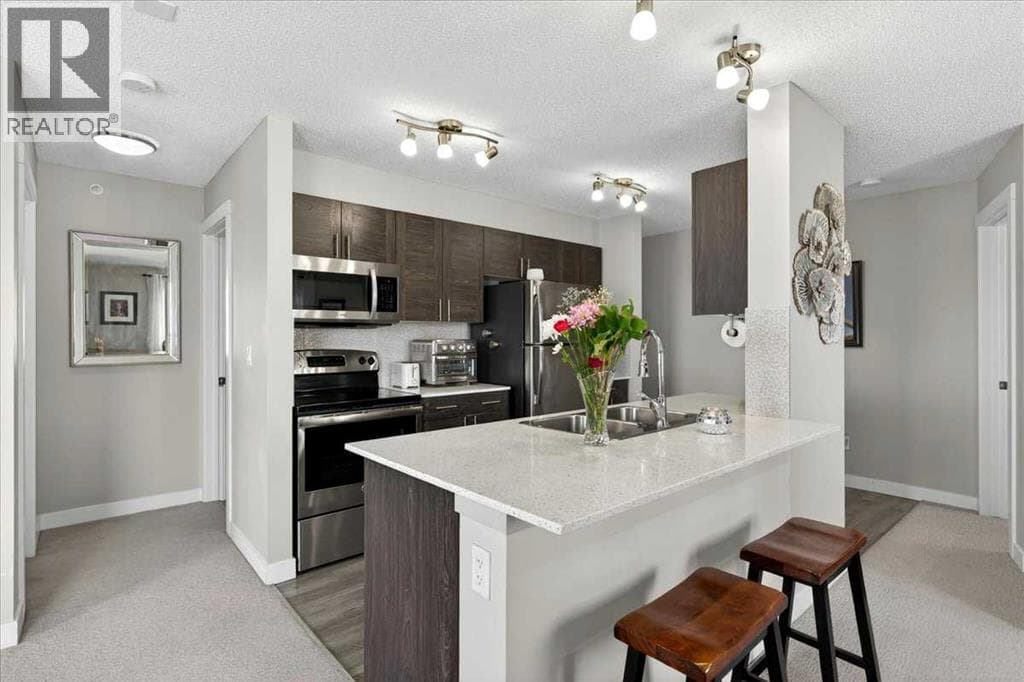401, 10 Kincora Glen Park NW — photo 4