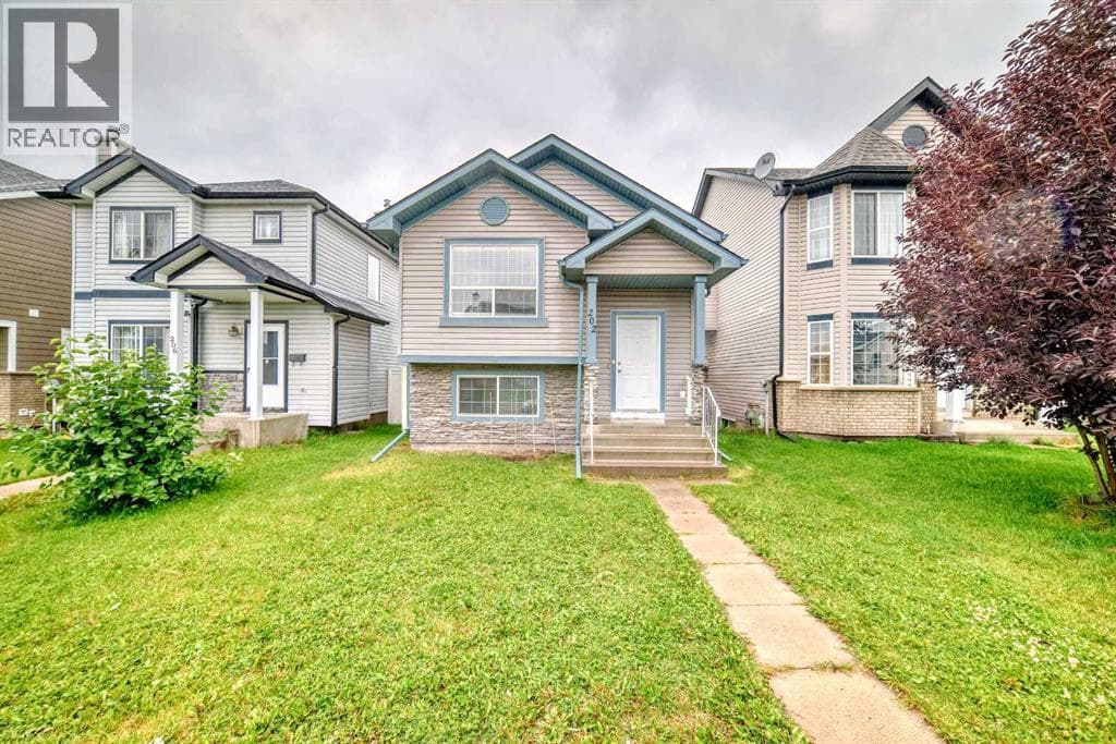 202 Saddlemead Green NE
