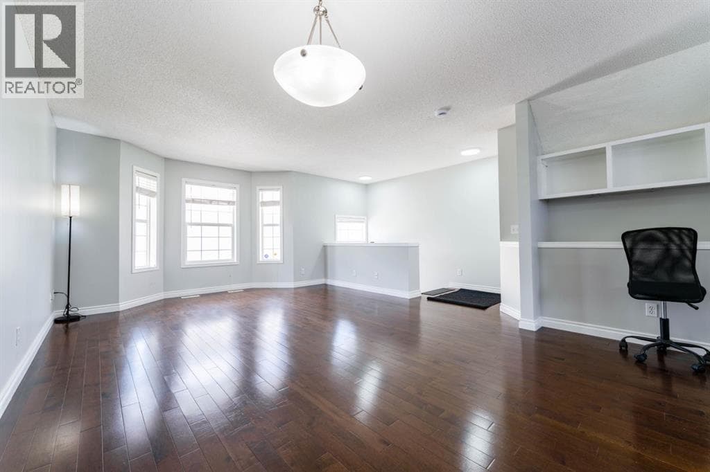 45 Tuscany Springs Garden NW — photo 3